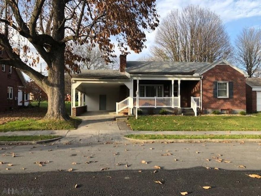 Lovely brick home with 3 bedrooms, and 1 full bath.  Property has been well maintained with large flat backyard, carport, partially finished heated basement with a  bath.  Some newer windows, newer vinyl railing on porch, and storage shed.  Property comes furnished.