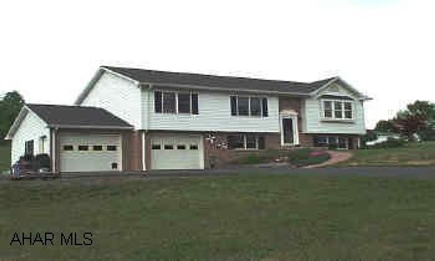 Just like new.  This immaculate 3BR bi-level features:  kitchen with ceramic tile, plenty of cupboards, large pantry and island area leading to DR and LR; vaulted T&G ceilings; recessed lighting in MstBR, LR & FR; family room with gas log wall unit, den, lots of storage, central air, large deck, above ground pool, large 2 car garage, storage shed.  Follow 26S to Fluke Farm road (on right), follow road to intersectionand turn left onto Redstone Ridge Road, follow to Dandelion Dr. turn right, follow to Clover Drive, bear right, see sign. Property is in Kauffman Development.