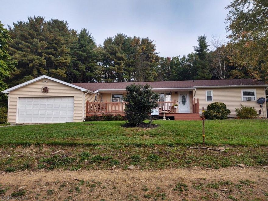 Great country rancher on 2.9 acres with 4 stall horse barn. The house contains 2 bedrooms, equipped kitchen, dining room, large living room with fireplace and separate utility room. Full unfinished basement and oil hw heat. Large front deck. Pasture area and outdoor riding ring. Picnic pavilion and chain link fencing for dogs.