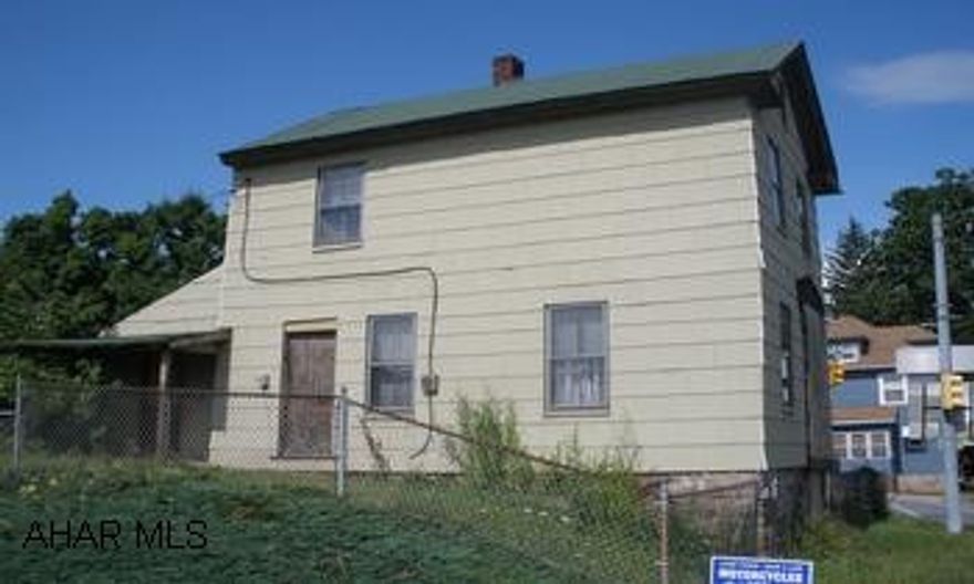 Also includes house on Blair Street that is uninhabitable and needs torn down. Historical district.