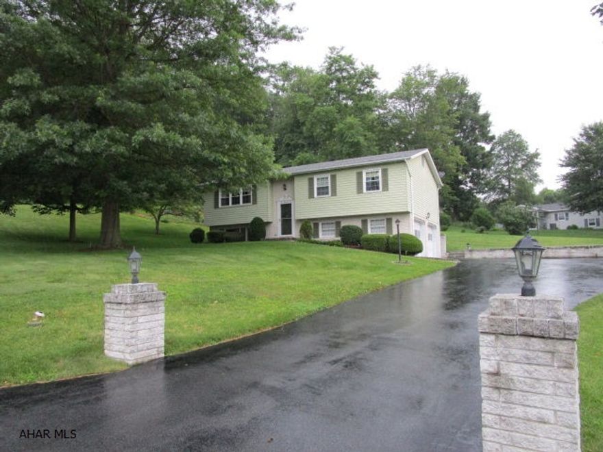 This very well maintained bi-level rests on a corner lot with a manicured lawn and professional landscaping. Super location in the borough and just a short walk to the downtown area. Main level offers a living room, kitchen with eat-in area, dining room, 3-beds and a full bathroom. Finished basement with a family room, laundry with half bath and bonus or storage room. 2-car integral garage with auto openers and a spacious blacktop driveway. True brick accent, large rear screen porch and security system. Move-in ready!!