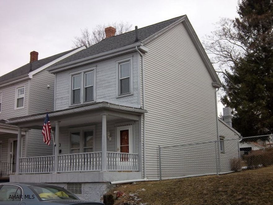 Move right into this bright & cheery 2 bedroom one bath home. Updated kitchen and bath, newer carpeting. Potential for 3rd bedroom on top floor. Only $29,500.