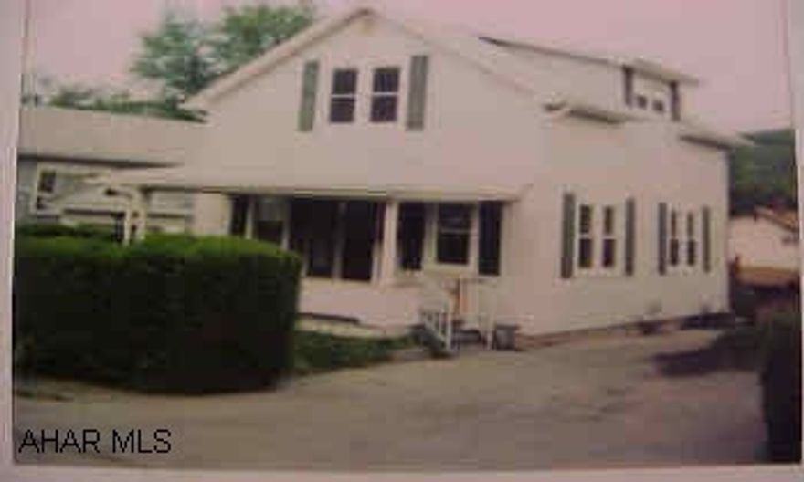 Newer siding, roof, windows, finished family room, double lot.  "As is - where is".