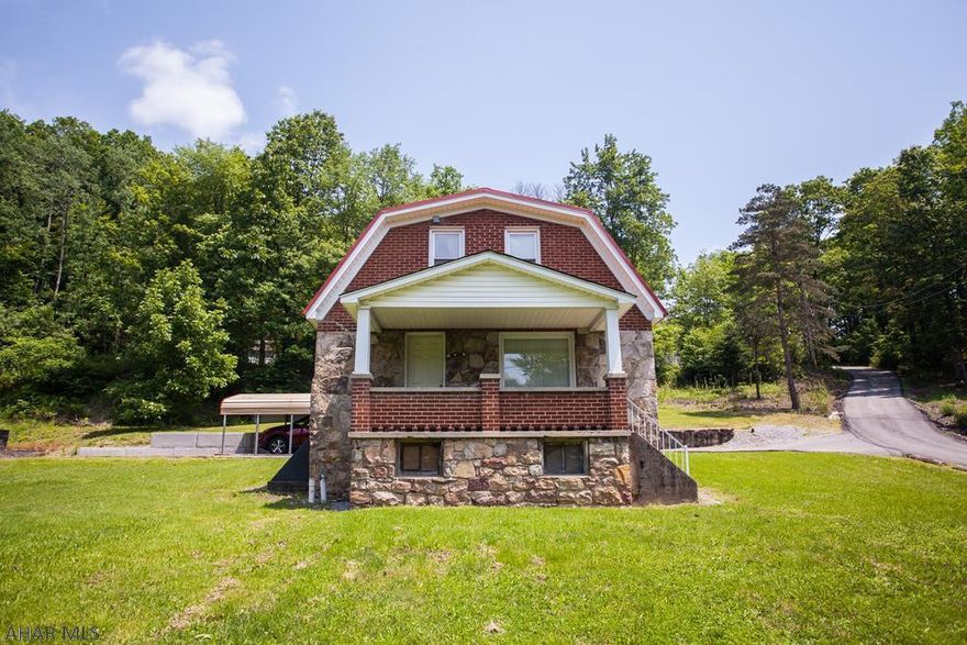 LOCATION! LOCATION! LOCATION! Enjoy this one bedroom with a bonus room upstairs. Located just out of town, but still close to everything. The front porch is a great place to enjoy the peaceful location and watch the wildlife. NEW roof!