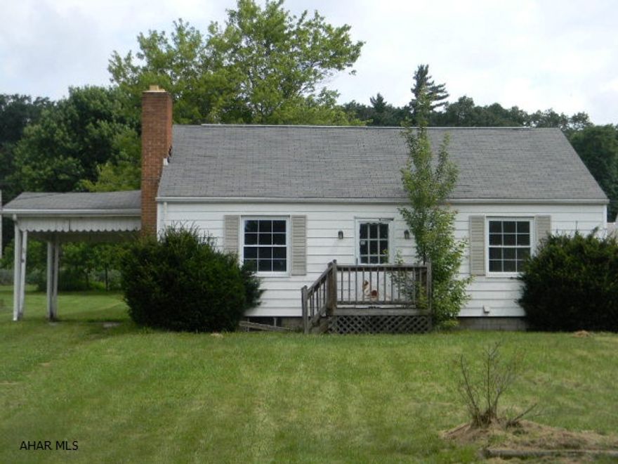 One story vinyl 3 BR/ 1BA home with hardwood floors and full unfinished basement. Walk up floored attic, one car, detached garage. One large lot with plenty of garden space. Needs TLC, offered AS-IS. Immediately available.