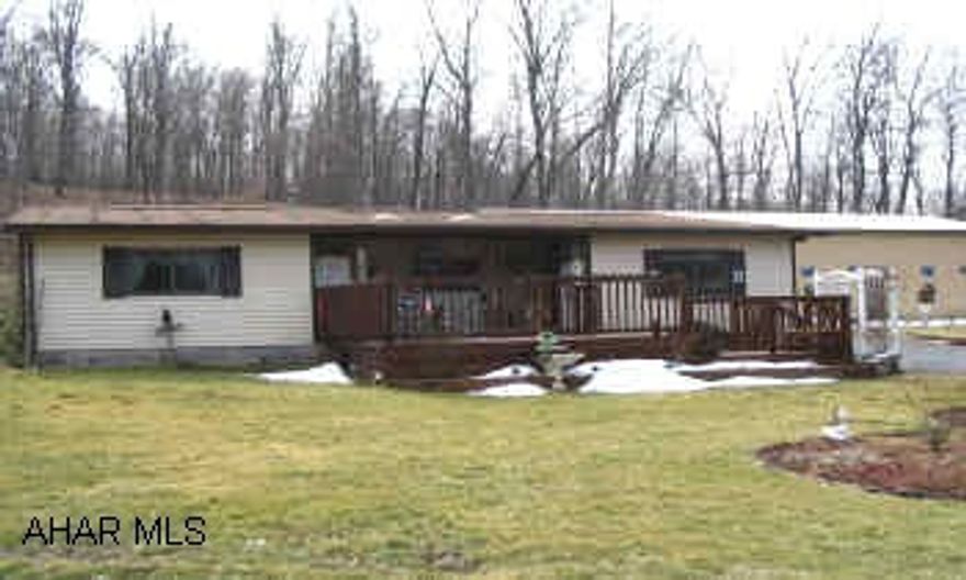 Large addition, was mobil home with few signs remaining. Pretty country setting with 20 fruit trees, grape arber. 30x60 garage, patio, and deck. Close to Rails toTrails and Barroner's Fields. Contingency - Seller must find suitable housing. Seller has current mortgage and no flood required.