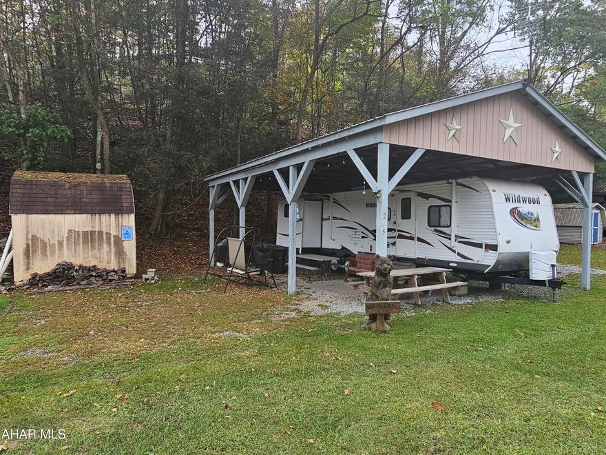 2012 camper with pavilion on 2 lots inside Glendale Yearound. 2 beds, 1 bath. Can sleep 12!!! Pavillion over camper and 2 sheds. Camper is in great shape. Everyhing works. Nice level lots. Extra lot available. Glendale Yearound is a gated community located minutes from Glendale Lake and Prince Gallitzin State Park.