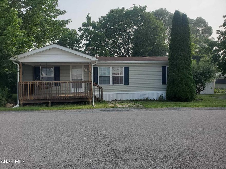 Well-maintained doublewide.  Vaulted ceilings throughout.  Carpets just cleaned.  Beautiful front porch.  Great home - ready to move in and enjoy.  All information per tax card.  Buyer to verify.