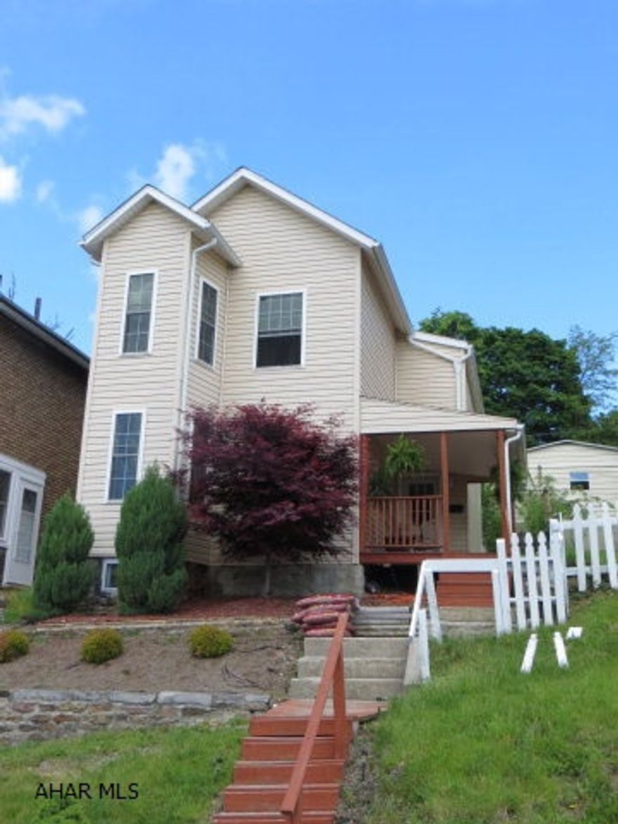 Move in ready!  This totally renovated, tastefully designed home features 3 bedrooms, 1.5 bathrooms situated on a double city lot.  Additional propety features include spacious rooms, an open dining room/kitchen floor plan, first floor laundry, and new first floor powder room.  Ceramic tile and flooring updates were completed in 2012. The exterior is vinyl sided, with thermo-pane windows.  Relax after a long day on the quainrt front porch which provides a great view of the mountains, as well as the goldfish pond with waterfall which accents the property.  A large metal 2 car garage has been added to the rear of the property, and recent updates to the home include the roof (2009), furnace (2009) and hot water heater (2010). The property is in the Altoona School Dist. and has very low taxes!