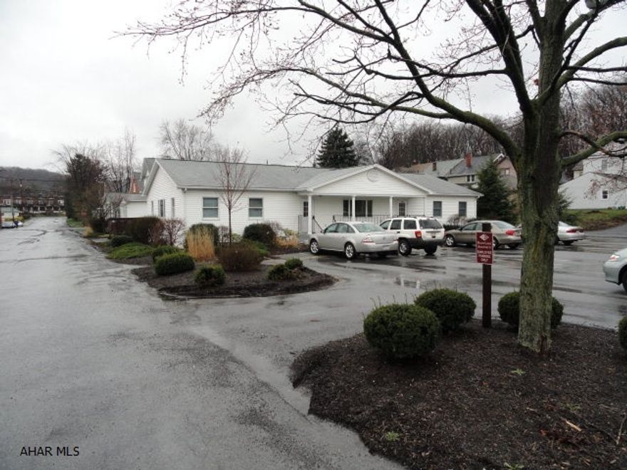 Modern office building.  Cross parking easement for adjacent parking lot that provides ample off street parking.  Floor plan available.  Greast visibility on Logan Boulevard.