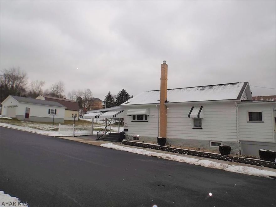 Pristine condition best describes this lovely home with beautiful refinished original oak hardwood flooring, updated bath.This is a kitchen you will enjoy cooking/baking with newer Bosch stove, lovely maple cabinets, and gorgeous granite countertops. The living room is spacious and comfortable with a bonus room beyond. The basement is heated, clean, & dry, allows more living space.  The Oversized heated garage 28x32 could handle four cars (for those collectors), or your toys, workshop. All of this is on 4 city lots!  Home & lot 42x110   Garage & lots 79x120.  Taxes and square footage to be verified by buyer.   Commission is not paid on sellers assist.          OPEN HOUSE will be scheduled in February if still available!!!