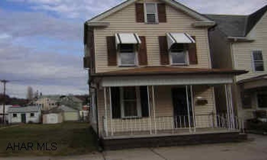 Near Juniata College. Double Lot. 2 car garage.