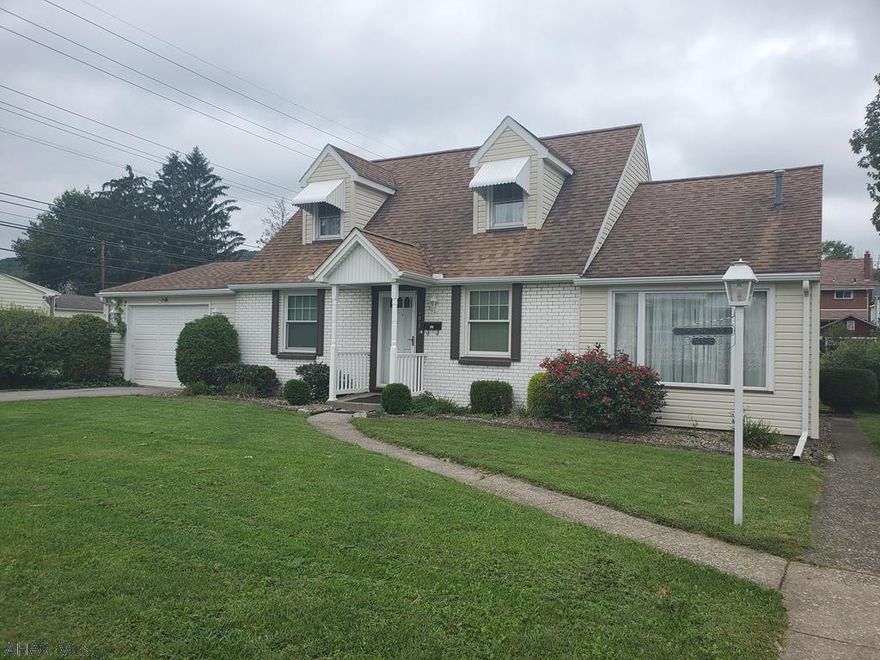 Charming Cape Cod with fenced in flat lot in a great neighborhood.  This home features a sunken living room, formal dining room, kitchen with eat in breakfast nook and a paritally finished basement perfect for your man cave.  Home also has a wonderful fenced in flat lot perfect for the kids to play in and is close to Fairview park as well as the Penn State Altoona Campus.   This home is move in ready!