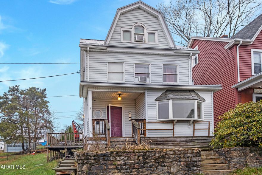 Completely remodeled and renovated home on a large double lot in the Juniata section of Altoona. The main level features a bright living room with an office or reading nook, a formal dining room, a galley kitchen with plenty of storage in bright white cabinetry, a half bath, and a convenient main-level laundry room. The second floor includes a full bath, a spacious master bedroom, a second bedroom, and a bonus room ideal for additional storage or a walk-in closet. The finished third floor offers a heated third bedroom. Move-in ready and updated throughout!