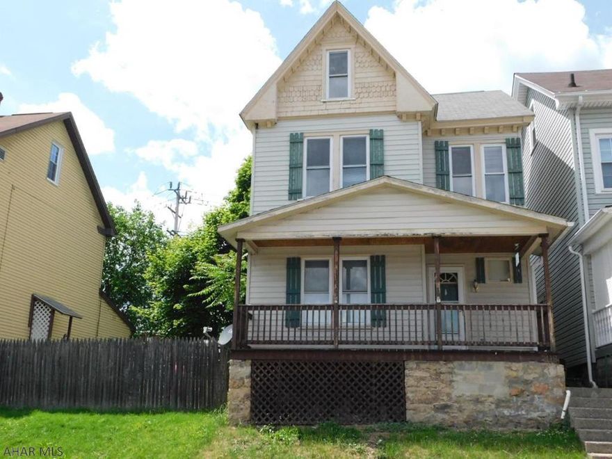 Fantastic Investment opportunity or perfect fixer upper.  Spacious first floor with large kitchen.  Back yard features covered back porch and a 1 car garage.