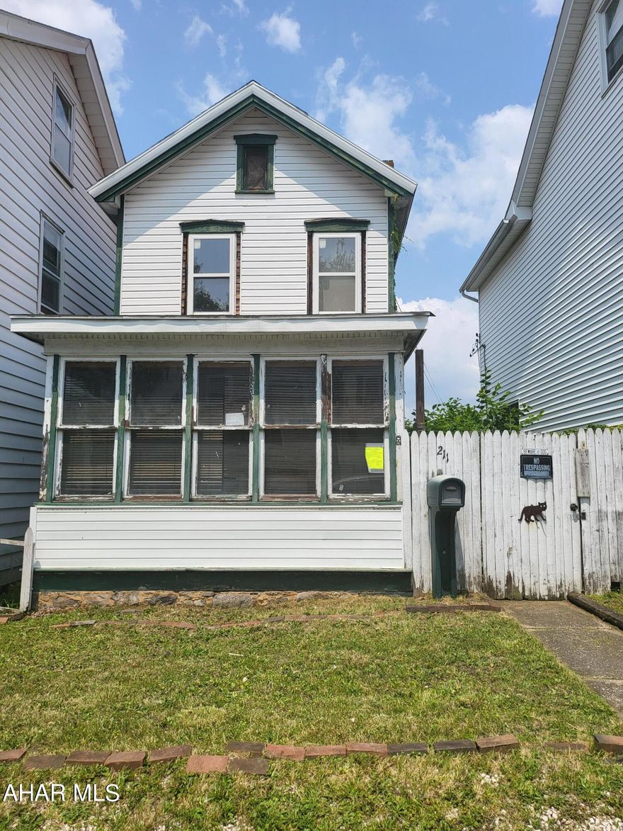 Looking for a Handyman Special home this is it.   Potential for possible off street parking. Great location. Call agent for details.