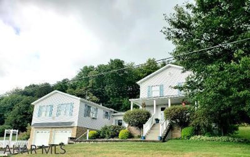 Tremendous panoramic view from front porch!!  Immaculate 4 bedroom 1.5 bath home with spacious Family Room, modern kitchen with island, Master Bedroom with double closets & wooden vaulted ceiling, 2nd-floor laundry, maintenance-free exterior, 10x22 vinyl shed and 2-car garage on 1.05 acres!  J-517