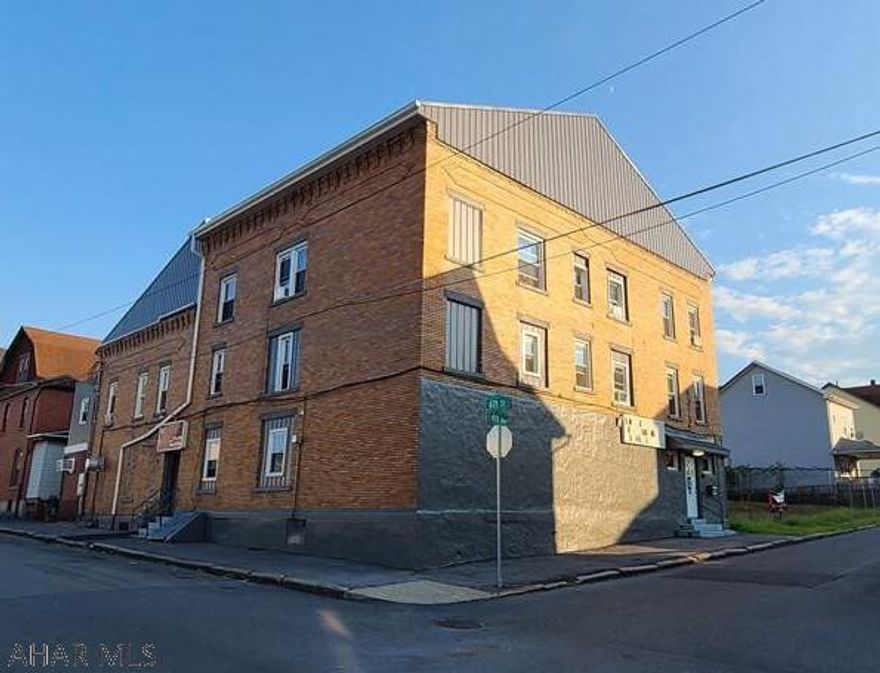 INVESTORS!  This property is a cash cow!  14 efficiency rooms with steady weekly or monthly income.  The bar includes the Hotel Liquor license, all kitchen and bar equipment and appliances with slushie machines, pool table, stereo surround system and contracts can be kept for dart boards, juke box, and skill games.  The newer bar furnishings are also included.  The seller has made all of the updates and upgrades including a new metal roof in 2019, new electric in 2017, new A/C units in 2017, new kitchen in 2017, new bar in 2020 and all rooms have been remodeled over the last 3 years. Features include a PA Skill game area that allows smoking, coin operated W/D income.  This sale will include 41 other properties at a sales price of $3,250,000.  Sale is AS-IS, WHERE-IS.