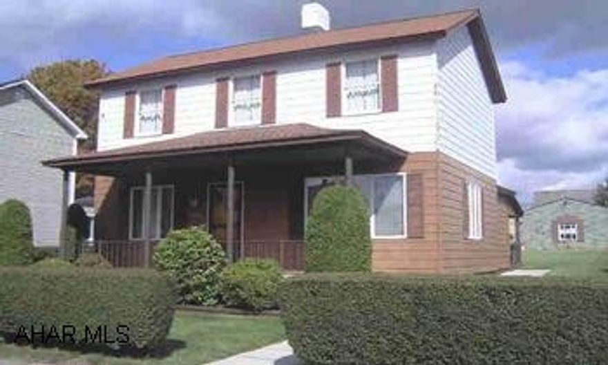 Revloc- 2 story, 3 BR home on a 50 x 150 lot.Recently remodeled large oak kitchen. Freshly painted.   2 car detached garage.