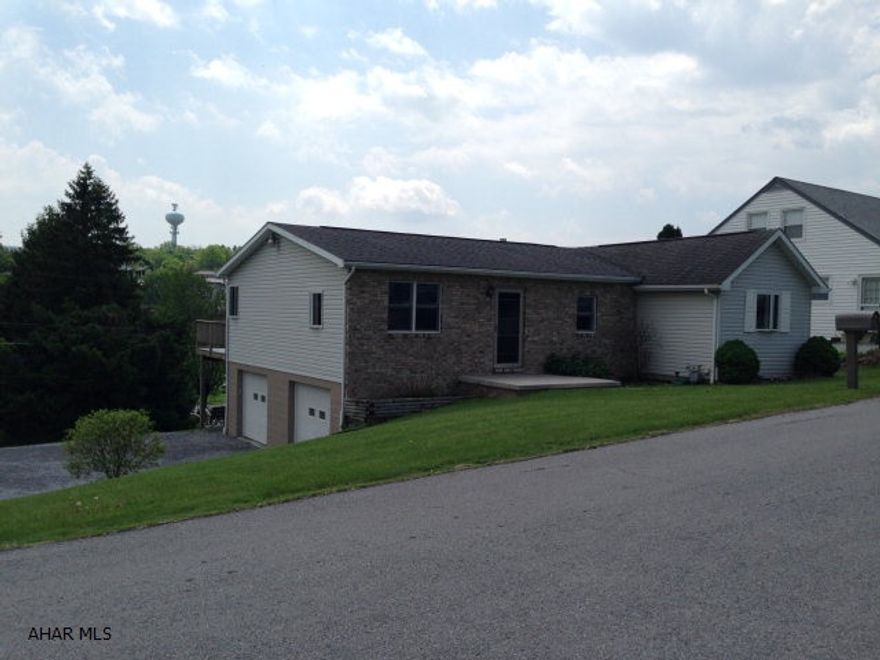 OUTSTANDING Raised Ranch on dead end street! Totally updated with all the extras! Not a thing to do but move in. The open floor plan is amazing, the closets are fantastic, the counter space is endless, cabinets galore, Trek deck off dining area has a remarkable view. There is a fenced dog yard among the large 150 x 120 yard! Drive way leads to a 2 car integral garage. Central air, garbage disposal, 200 amp electric service. This home is AWESOME! Come see it today!