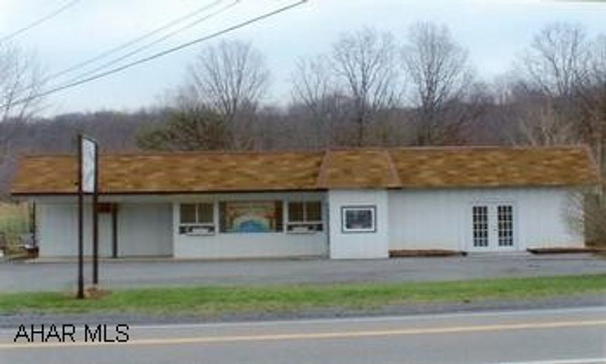 Attractive 1-story frame building with 97' road frontage and large paved parking area. Rooms ror offices, display and storage. Past used as a restaurant, recently as a landscape contractors office and showroom. Public bath rooms (2) with potential for 3rd. Walk-in cooler, area for commercial kitchen. NEW PRICE, MOTIVATED SELLER