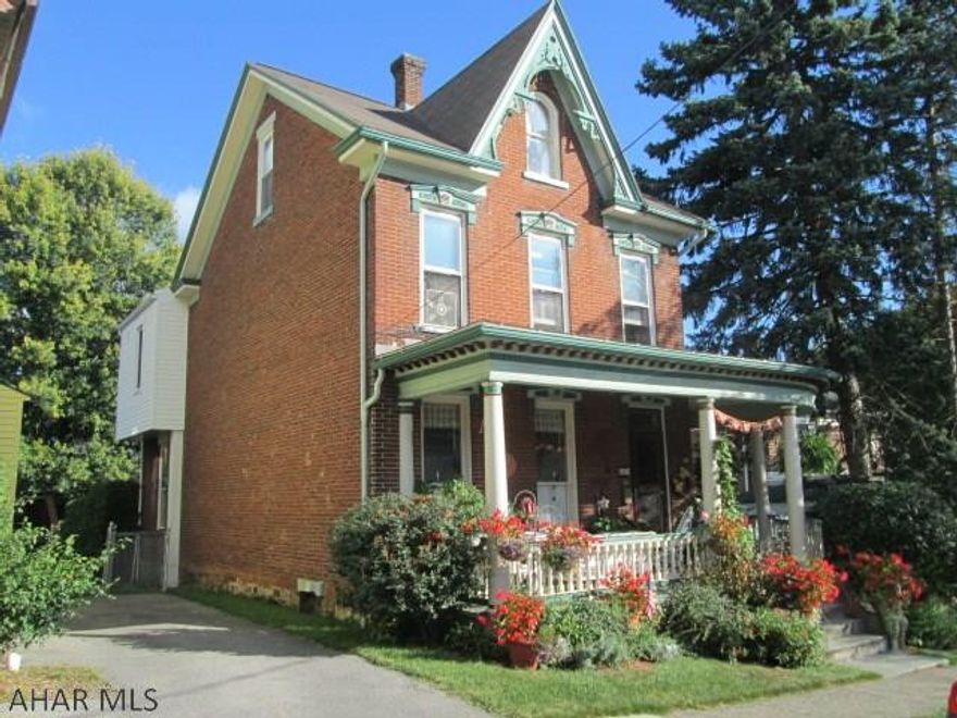 All brick 3 bedroom offered in the historic borough of Hollidaysburg. This home speaks of a by-gone era but with all the updated conveniences. The combination dining room and family room flow into the updated island kitchen. The kitchen offers tile flooring, island kitchen, and oak cabinets. The rear porch overlooks the waterfall and beautiful flower gardens. Make sure to see the 15x10 custom built shed!