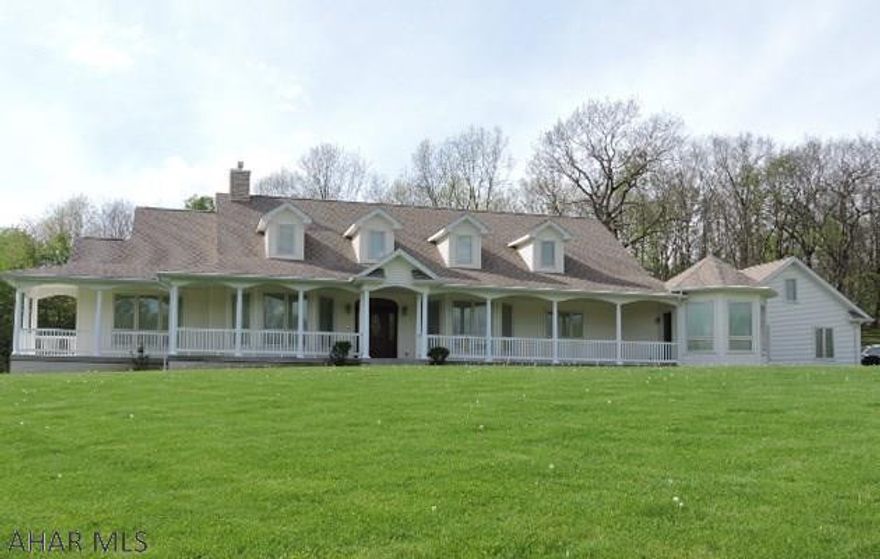 Stunning 1 story home priced well below replacement cost.  Top of the line construction with oak trim & solid 6 panel doors throughout.  Oak kitchen & baths with soft close doors.  Custom cabinetry in kitchen includes pull out pantry & slide out shelves.  Built in trash bin, cutting board & bread drawer + too many to mention. Octagon room off kitchen has tray ceiling and tons of natural light with walls of windows.  All windows are Pella Designer Series with integrated blinds & screens. Intercom & security system. Geofinity geo thermal heating & cooling system is state of the art & high efficient.  Hot water radiant heat throughout. Generac whole house automatic standby propane generator.  Adjoins State Game Lands #60.