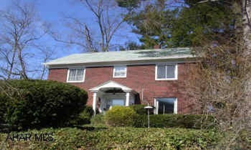 2 STORY CLASSIC BRICK CLASSIC LOOKING 2 STORY ALL BRICK IN HILLCREST ON LOVELY WOODED LOT.  GREAT MECHANICS.  ENTRANCE FOYER, OAK KIT, 11/2 BATHS. NICE HOUSE, NEWER ROOF, REPLACEMENT WINDOWS, FIREPLACE. WONDERFUL QUIET SUNNY SUN PORCH. GREAT LOCATION.