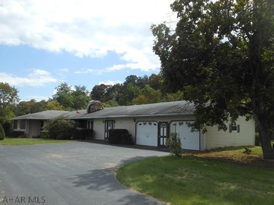 This is a Fannie Mae Homepath property. This is a one story home located in Hopewell Township. This home has a large 4.429 acre lot and borders a stream. The home has a screened in rear porch and a 2 car attached garage. The house features a bonus room, laundry room, office, kitchen, large living room with hardwood floors and fireplace, three bedrooms, a full bath and a 1/2 bath off of the kitchen. With some custom touches, this house could be your home. This house is in a flood plain.