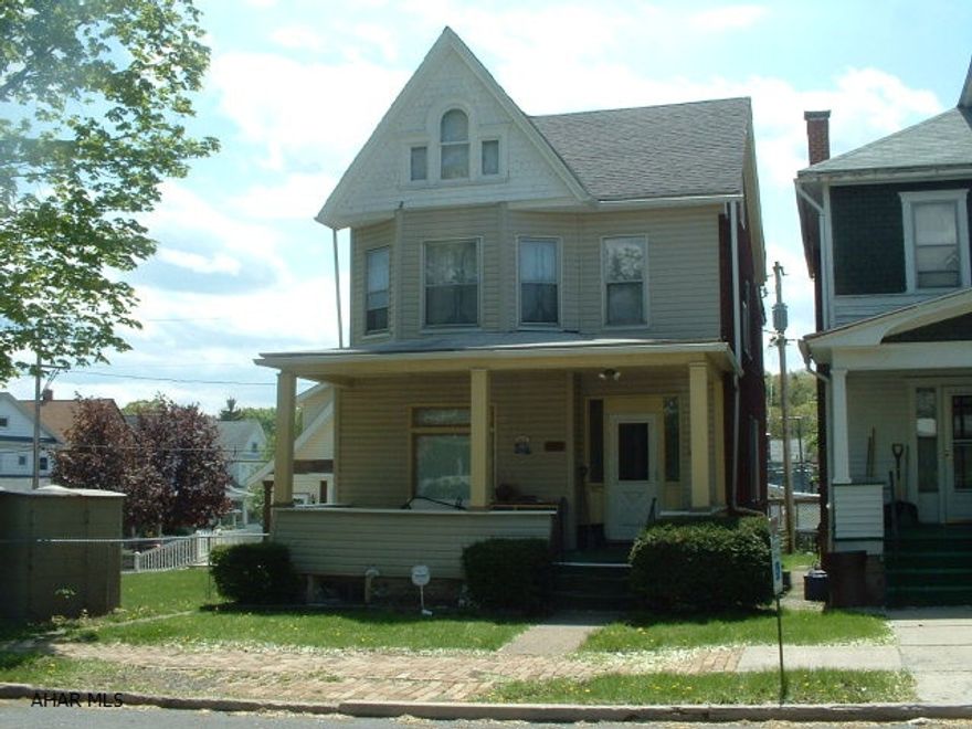 Roomy 2 1/2 Story On Very Nice Block.  3 BR, 1 BA, With EIK, Bonus Room, Finished Attic.  Priced To Sell!  New Roof, New Furnace & Siding.