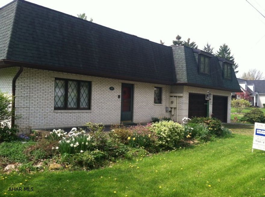 Pretty brick 2 story home with attached 2 car garage sitting on a level lot in the quiet area of Newry. Beautiful cherry kitchen with large island open to the family room with wood burning fireplace. Laundry area with summer kitchen on main floor. Home offers heat pump, electric storage units, baseboard. 2nd floor has large bedrooms with a great room for tv and/or game room. Large detached 3 bay garage with 2nd floor for storage or workshop. Seller offering $3000.00 paint allowance.