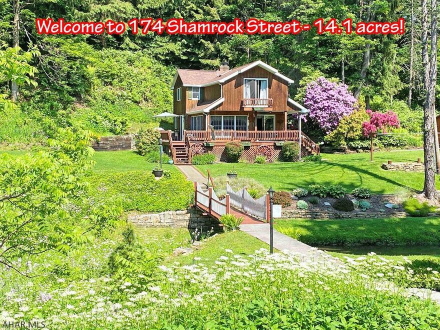 Incredible setting with Hinckston Run stream going through your front yard! Beautiful 3 Bedroom shiplap cedar home! Park at the 3 car garage & then walk over the bridge to your new home on 14 beautiful acres - part wooded. Relax on the covered front wrap-around deck & enjoy the wildlife & wildflowers. Beautiful hardwood floors! Living Room, Office area, eat-in Kitchen w/ a HW floor, dishwasher, range, & stove. Enjoy meals in the sun-drenched Dining Room surrounded on 3 sides by windows.The Master Bedroom has a vaulted ceiling, 2 closets & a private balcony overlooking Hinckston Run. The full Bath is updated & features a skylight & laminate floor. There is a 2nd Bath in the walk-out Basement & laundry area.Storage shed. There is an access road on other side of stream. PLEASE NO DRIVE BY'S.