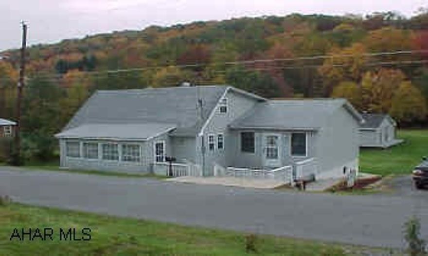 Completely renovated. New fam rm addition w/cathedral ceiling, woodburner. Vinyl siding. Large yard w/large shed. Small shed not included. Second bath in basement.