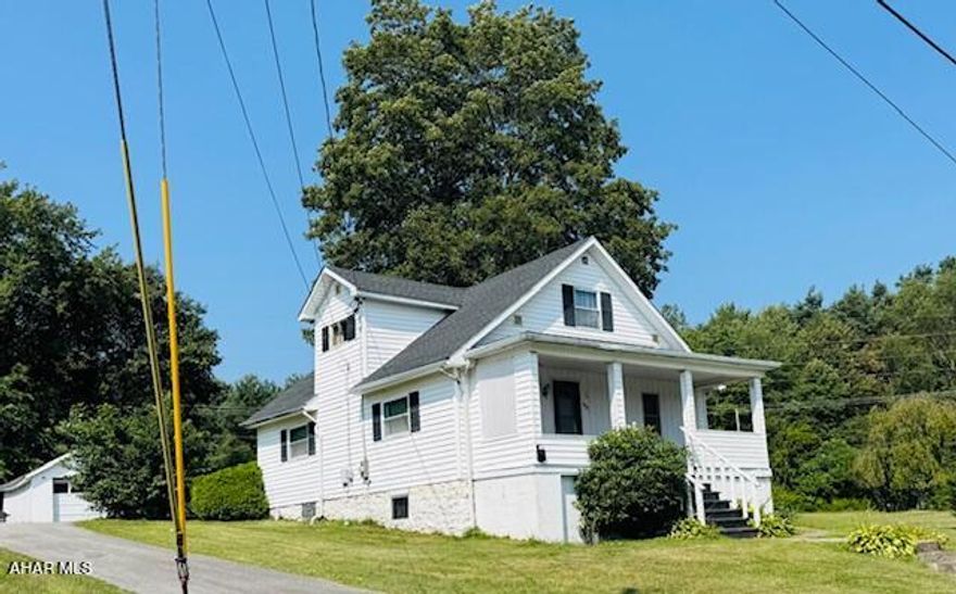 This cape cod home is situated on a half acre lot and has a one car garage! The first floor has a nice size kitchen, dining room living room, bedroom and bath.
The second floor has two additional rooms. 
The large lot is perfect for outdoor entertainment!
Call to take a look and bring your ideas to this one.