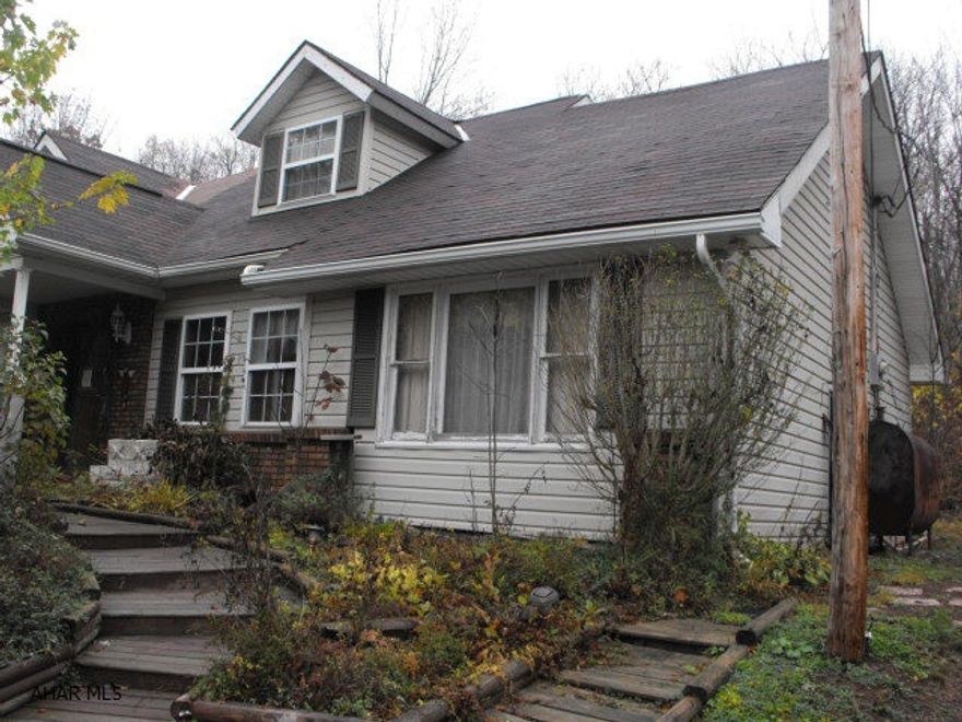 Tons of potential - Large cape cod on over 1 acre.  Seller makes no representations or warranties as to condition of property, improvements or appurtenances, and property is sold AS IS-WHERE IS, only cash or conventional offers will be considered. Buyer to pay $299 Technology Fee to Hubzu.com at closing