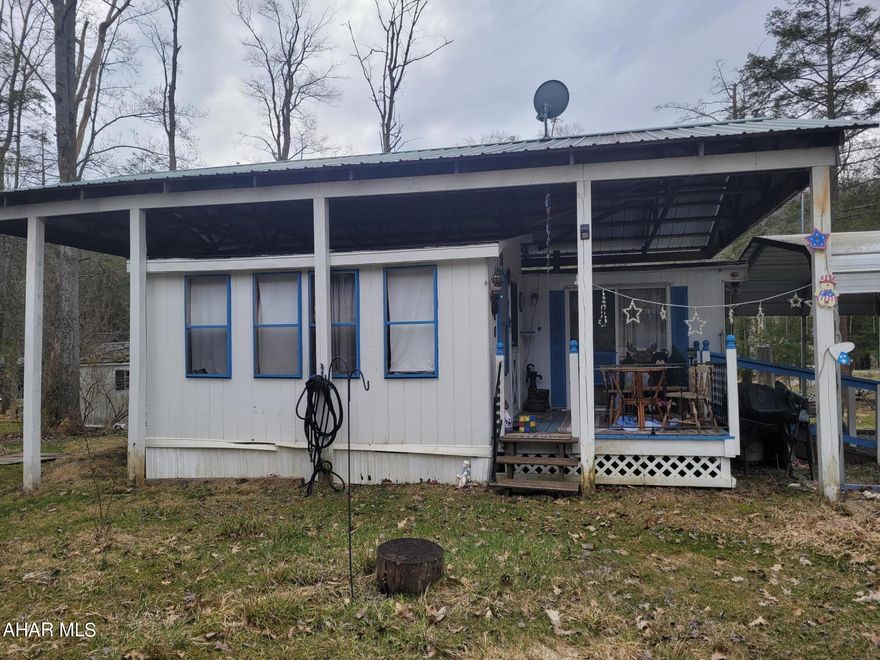 Large campsite with a spacious park model and addition offers room for all both inside and out.  Metal carport, shed give you storage space.  
Full size water heater so you have ample hot water.
Bring the whole family camping!