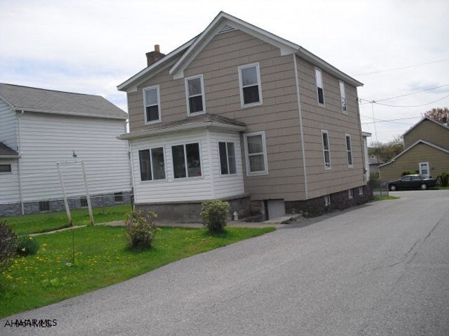 Large two story on corner lot, newer kitchen, new 1st floor bath, corner, large detached garage, absolute move in condition