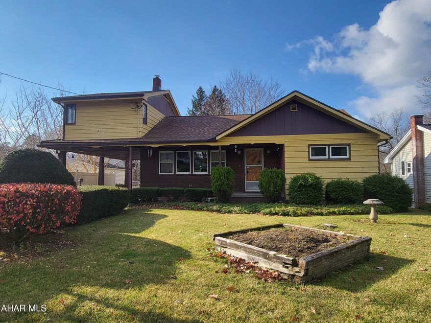 Tyrone Borough 1 1/2 story 4 bedroom home with new roof, paved driveway and spacious carport.  Large back yard.  The home offers hardwood floors, gas forced air heat with central air.  Walking distance to schools! Priced to sell!