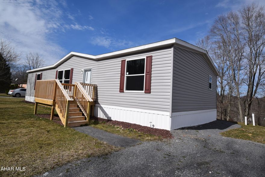 Brand new doublewide with a total of 1680 square feet of living space.  Stainless steel appliances.  Walk in closets.   New front and rear decks.  Off street parking. Must make application at Hillcrest Communities.  Lot rent is $355.00 per month and includes water, sewer, trash removal.