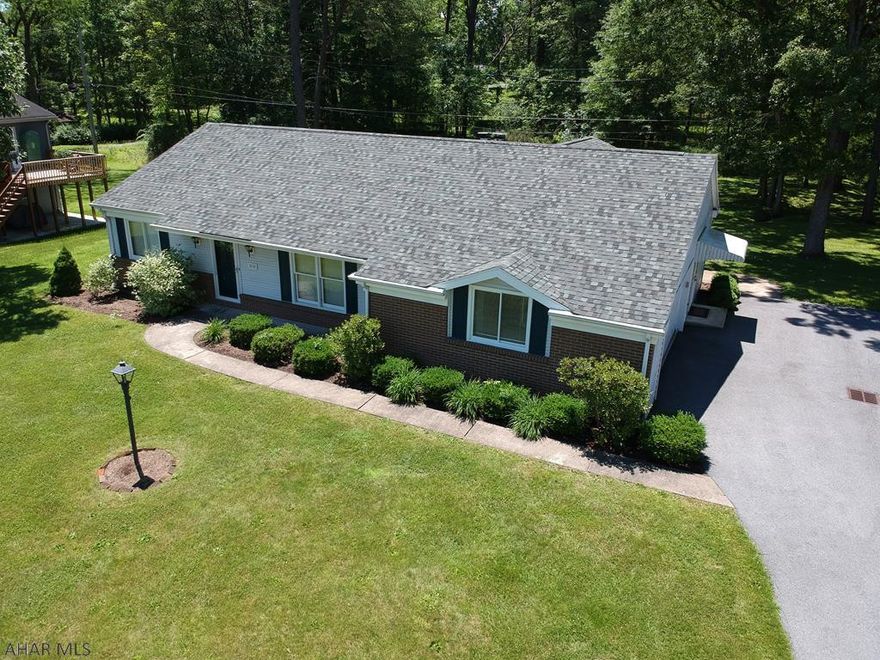 Beautiful one story ranch home with an updated kitchen and appliances as well as a wonderful sunroom with skylights so you can have a little bit of the outdoors while staying indoors. This home features a master bedroom that comes with it's own master bath as well as 2 additional bedrooms and a full bath. Also split units help reduce the cost of utilities! The roof is new and the lot behind the home is included for additional privacy! This home is close to Juniata College and just 45 minutes from State College.