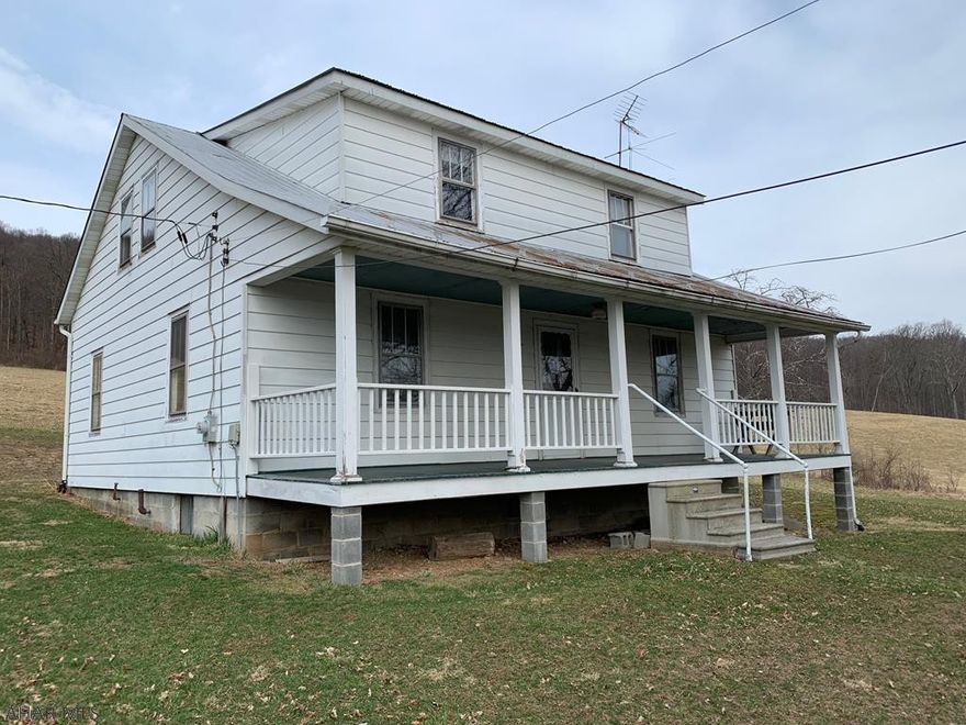 This picturesque property contains 293 acres of rolling fields, woods, and some amazing views!! Property adjoins PA State Forest Lands, is conveniently located in southern Bedford County close the PA/MD border and a short drive to Rocky Gap State Park and Resort and I-68. Cape code home offering a LR, FR, DR, Kit, and Bath on the main level. 4-Bedrooms on the second level and a full basement. Oak and pine board floors, 100-amp electric, spring and private septic. Large bank barn, outbuildings and the original log homestead is still on site. If you're looking for a scenic large acreage property, this is it!!