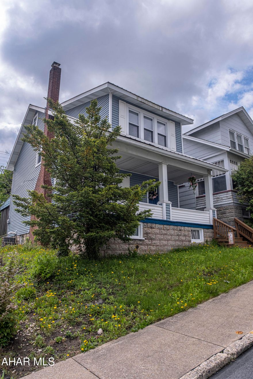 Completely move in ready three bedroom two bath home. Enter the home into the cozy living room with a wood burning fire place and plenty of natural light. The kitchen flows into the spacious dining room, complete with sliding doors to the outdoor space. Outside you will find a covered porch and fenced in back yard. Three bedrooms and a full bath are located on the second floor. If you love to entertain, this basement is for YOU! The basement is complete with a bar and plenty of space for couches, ping pong, anything you want! The laundry is located in the basement, as well as a full bathroom with a standing shower. Don't miss out on this home!!