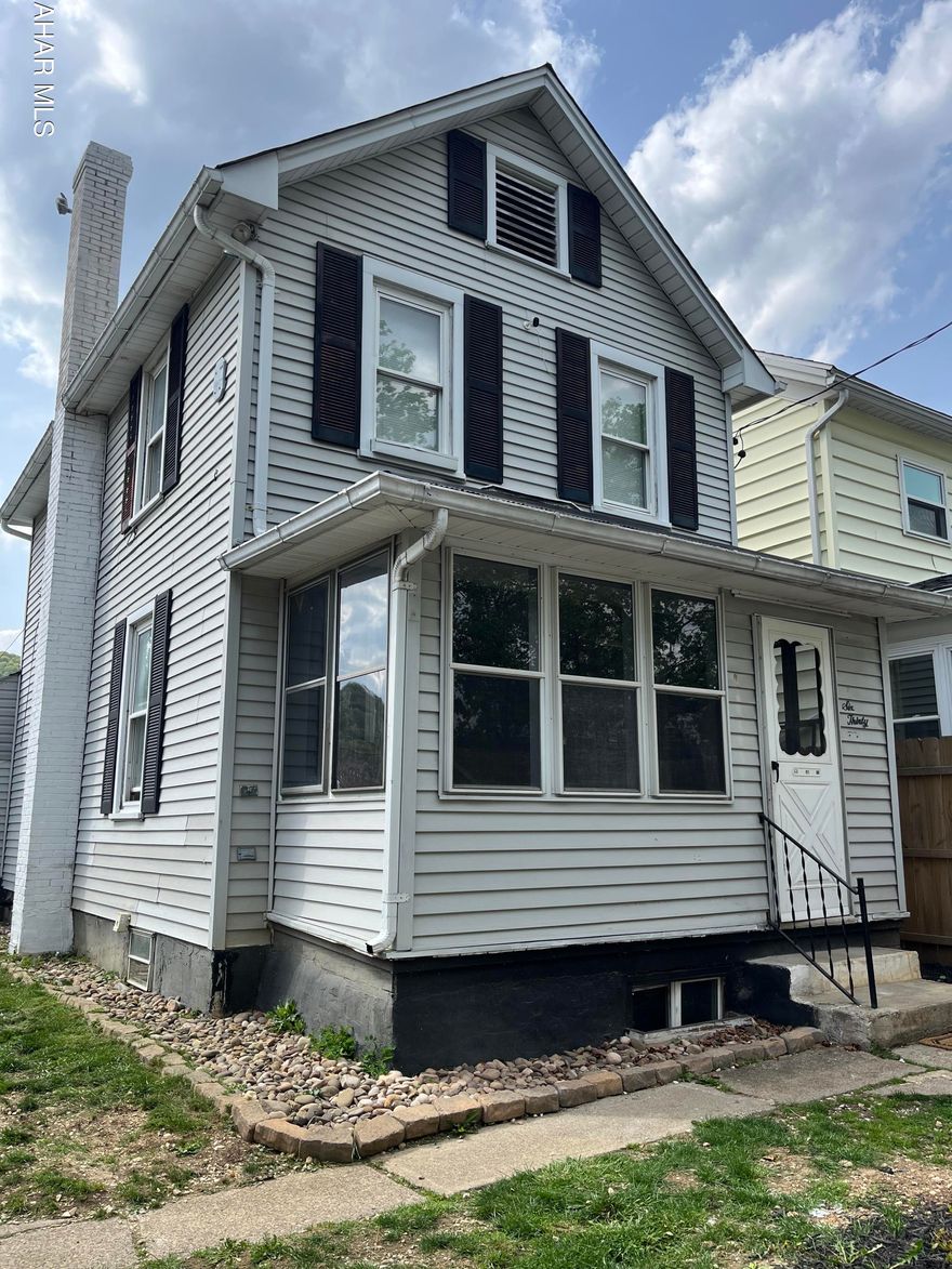 Spacious 2 bedroom with finished room in basement that could be 3rd bedroom or family room. Home has new carpet, fenced lot, detached garage with loft. Covered sun room/patio with hot tub included.