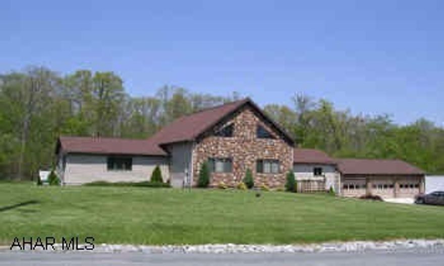 1-1/2 STORY CONTEMPORARY WITH 3 CAR GARAGE. DRAMATIC CONTEMPORARY STONE FRONT.  LIVING ROOM HAS CATHEDRAL CEILING WITH STONE WALL WITH GAS FIREPLACE, KITCHEN HAS WHITE CABINETS WITH CENTER ISLE, MASTER BEDROOM HAS FIREPLACE, LOFT ROOM OVERLOOKS LIVING ROOM, 4 DECKS, INGROUND POOL.  NO SHOWINGS UNTIL 5-22-04.