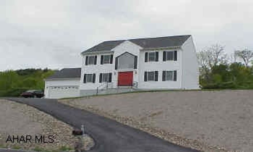 Spacious home with very bright rooms and large master suite with whirlpool tub.  Call agent for relo addendums.  Nice oak kitchen.