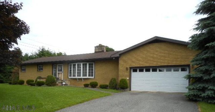 This all brick  one story  4 bedrm.,2.5 bath home  sits on a gorgeous, private lot. Large kitchen w/plenty of cabinets and spacious breakfast bar. Cozy family room off the kitchen with sliders  to a charming sun room surrounded with lots of windows creating lots of natural sunlight. Formal living rm w/fireplace and large bay window. Dining room has floor to ceiling mirrors.   Lower level has a great rec roomw/fireplace and fully equipped kitchen,  powder rm. and large cedar closet. Over sized  heated 2 car garage Those hot summer  days you can enjoy the outdoor yard with a 20x40 heated inground pool w/diving board, slide and patio area. Also  Includes   Parcel 1.4-17 29 known as  1224 S 16th St. (50x310). Parcel is under & subject to several parcels rights of ingress, egress & regress.