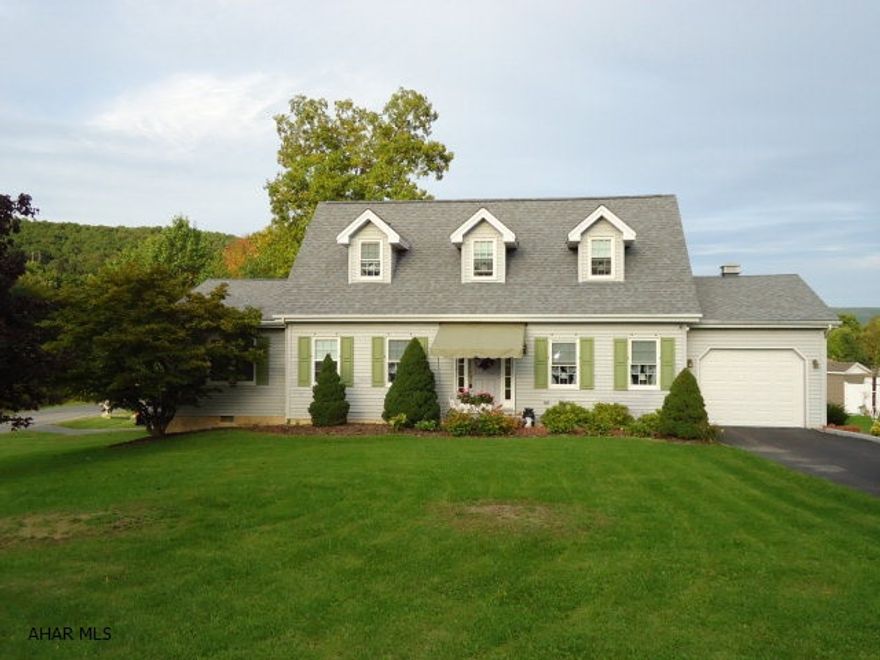 Adorable house in Logan Twp.  Could be 2 or 3 Bdrm. house.  Main floor offers Kitchen, DR, Living Room, Half Bath and Bdrm. or Family Room.  2nd flr. has 2 Bdrms and Full Bath.  Corner lot, covered deck.  New roof + windows.