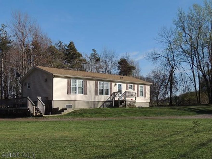 1 acre country setting!  3 bedroom 2 bath double wide with a full finished basement has room galore to spend all your time at home with family and friends. This home offers new carpet. large family room in the basement with so many options. 1 car detached garage with a storage loft. 2 level deck. above ground pool. and so much more