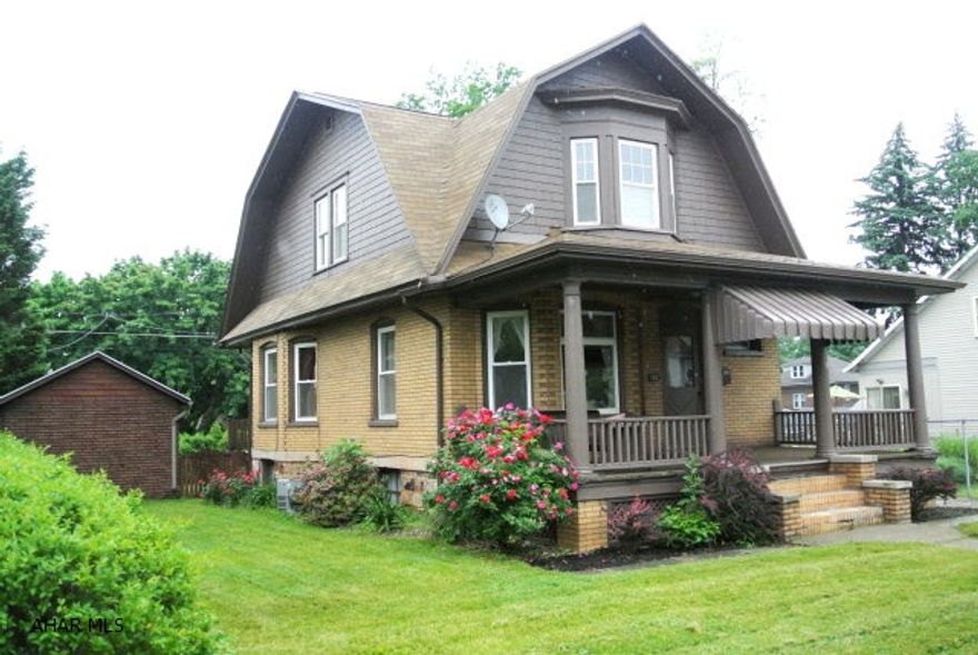 What a tremendous brick home in the Baker School District!  This Beautiful home maintains much of the original elegant character, yet has all the modern amenities.  It has central a/c, ceramic flooring, garbage disposal, updated kitchen, a new Bath fitters tub/shower, and new paint throughout are just to name a few.  Along with the 8ft ceilings, 3 walk-in closets, spacious Rooms, refinished original hardwood floors, make this charming home a very comfortable home for your family.  I must not forget.....my favorite part of this home is the second floor Sunporch.  It is full of Windows and light to enjoy your morning coffee and read the paper.   This tremendous home has so much class and style, it is a must see.  Seller will also replace garage roof for the buyer.