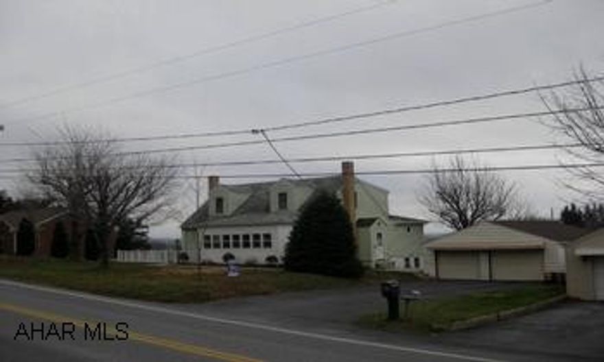 2 story vinyl sided home with 2 car det. garage & workshop. new kitchen, large lot
